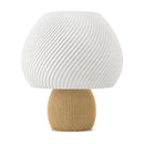 Abajur de mesa com cúpula branca em formato de cogumelo com nervuras em espiral e base canelada capuccino, em fundo branco