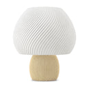 Abajur de mesa com cúpula branca em formato de cogumelo com nervuras em espiral e base canelada caucasiano, em fundo branco